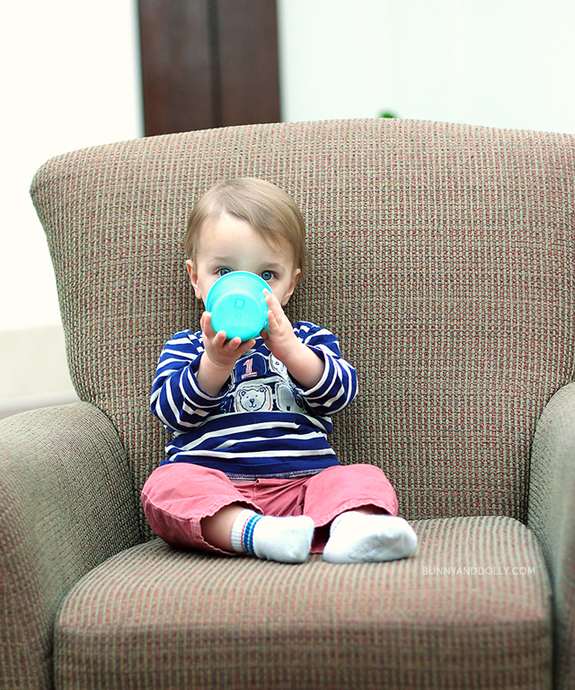 Toddler Boy Drinking Milk in Oversize Chair