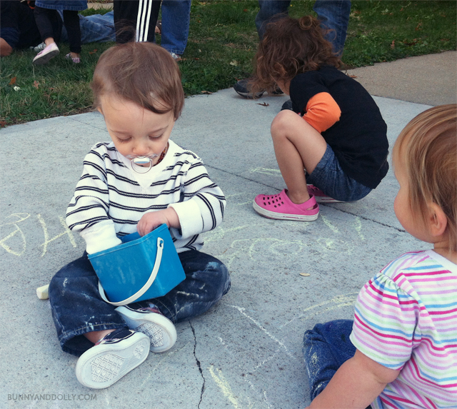 Toddler Playing with Sidewalk Chalk