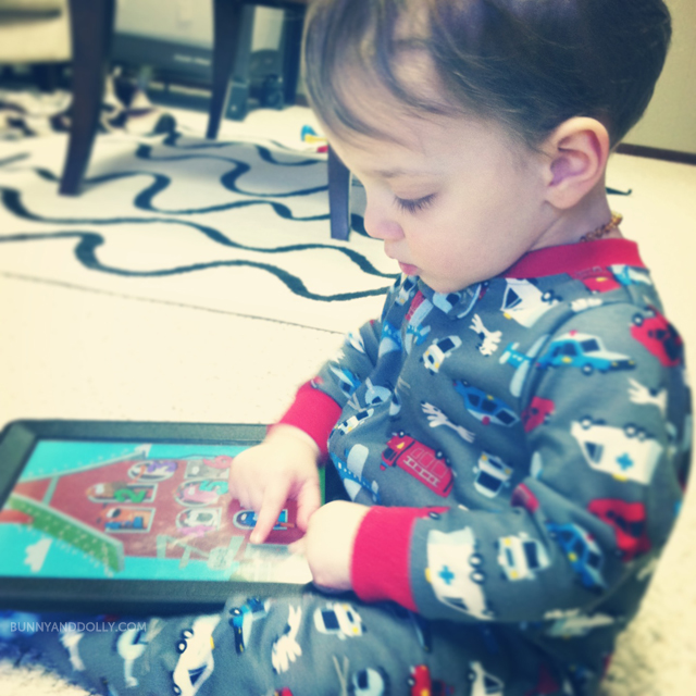 toddler-playing-ipad-bunny-and-dolly