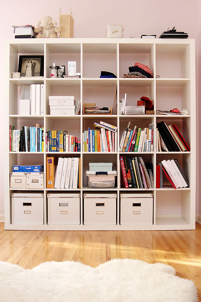 white ikea expedit bookcase in pink office
