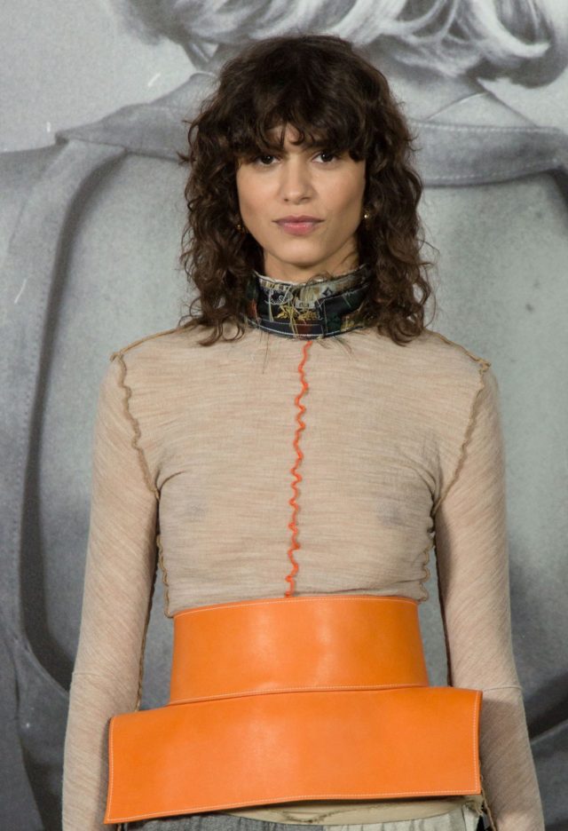 Curly bangs hairstyle on model Mica Arganaraz