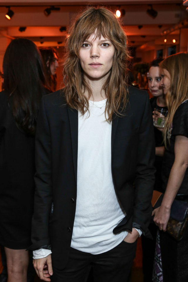 Model Freja Beha Erichsen with wavy hair and bangs